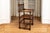 Antique bobbin-turned oak armchair in a dark stain with gorgeous patina, ball finials, vertical bobbin spindles, turned...