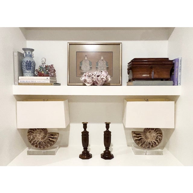 Handsome pair of English oak candlesticks in baluster form resting on octagonal plinth bases each retaining the original...