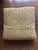 I had sisal carpeting in my living room and porch in my previous home. This pillow is made of rafia and is the actual...