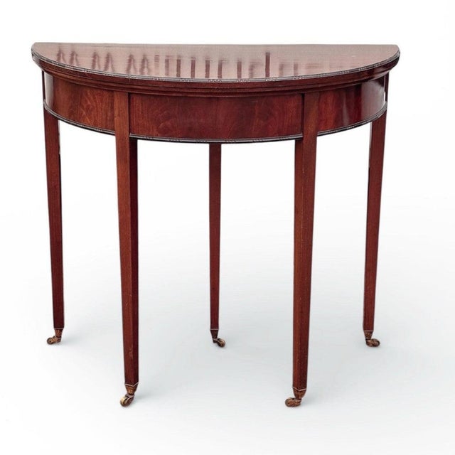 Antique Mahogany Games / Console Table with Fold Over Lid And Compartment Half round closed, circular open, when the...