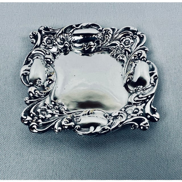 Set of four vintage repoussé nut/candy dishes. This set is beautifully cast with deep, defined repoussage work. They are...