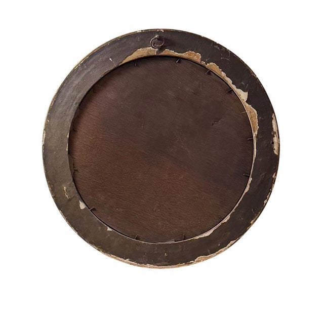 English Regency period convex mirror dating to approximately 1820. This handsome giltwood mirror retains its original...