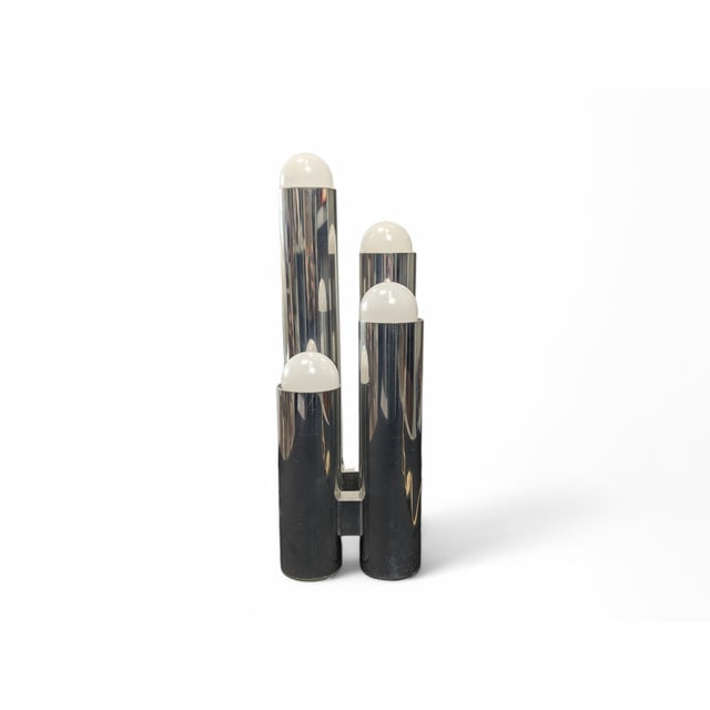 70s table lamp with style attributable to the master Gaetano Sciolari. In excellent condition, it shows no signs of wear....