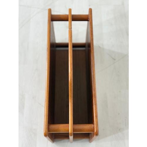 For sale is a beautiful vintage magazine rack from the 1960s in classic Danish design. This piece of furniture impresses...