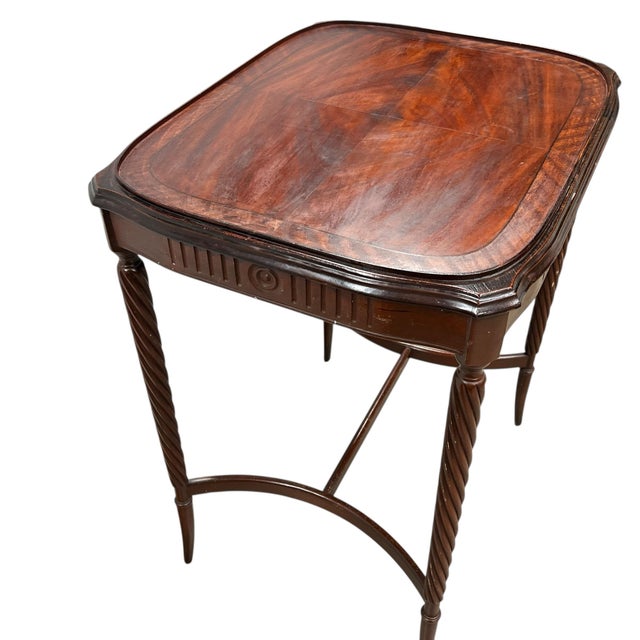 Antique mahogany side, drink, tea table with barley twist legs and burl wood top. Has some minor imperfections such as...