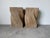 An exceptional pair of vintage sculptural rattan pedestals in the style of McGuire, showcasing a striking twisted...