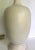 This is a stunning lamp from the mid-century that has a gorgeously modern shape and textured finish. The lamp is entirely...