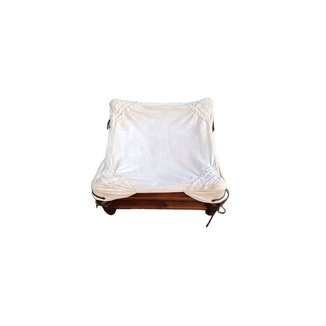 Boat stools, wooden frame, cotton seat held in place by leather ties. Original fabric. Made in Italy.