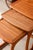 Add a touch of character to your home with this set of vintage teak nesting tables, a classic of 1960s design. Made by the...