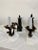 A remarkable pair of hand-forged wrought iron wall sconces from the 1930s, showcasing the beauty and craftsmanship of...
