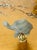 Agate stone with latticino pattern turtle figurine mounted on brass base as lamp finial.