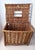 Sturdy, vintage handwoven English basket with lid, blends rustic utility with timeworn character. It's tightly woven...