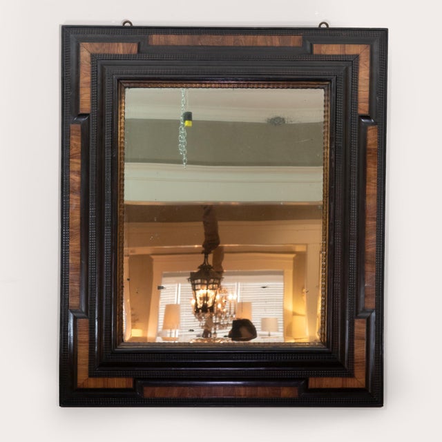 Large Scale Dutch Baroque Walnut and Ebony Mirror with gilt slip and mercury plate Holland circa 1680 A wonderful example...