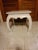 Beautiful vintage modern Asian style end / side table in white. Stylish design features sculpted legs and a raised top. It...