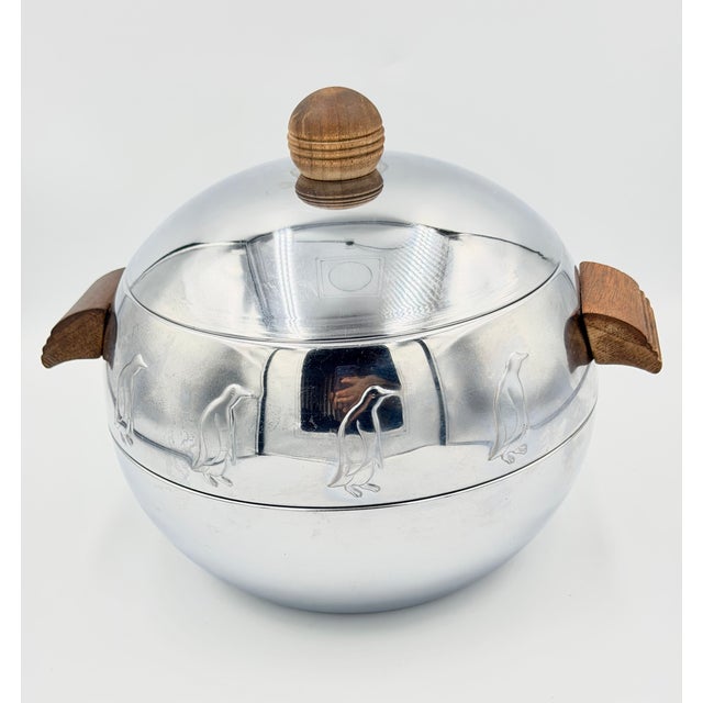 This vintage West Bend Penguin Ice Bucket is a playful yet functional piece of Mid-Century Modern barware or Serve ware....