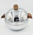 This vintage West Bend Penguin Ice Bucket is a playful yet functional piece of Mid-Century Modern barware or Serve ware....