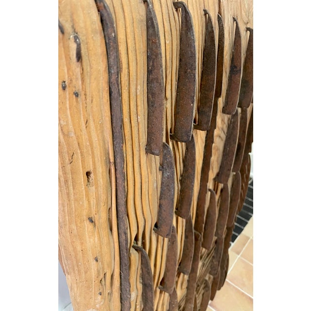 A wonderful, diminutive wheat thresher ready to be hung on your wall.