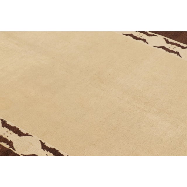 Hand-knotted in wool and originating from China circa 1900, this 5x7 antique Peking rug is a particularly special piece,...