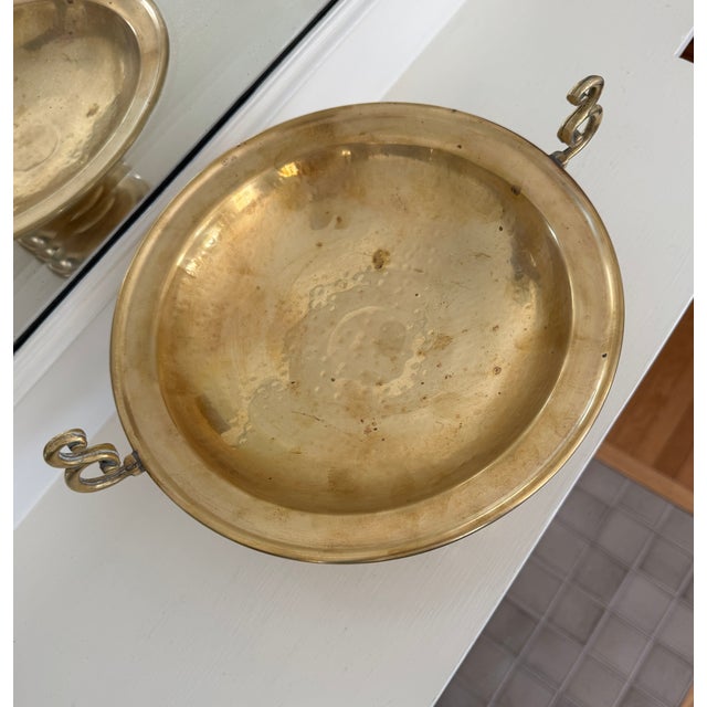 Lovely vintage hammered brass tazza with decorative handles and weighted base. Unmarked. Light patina.