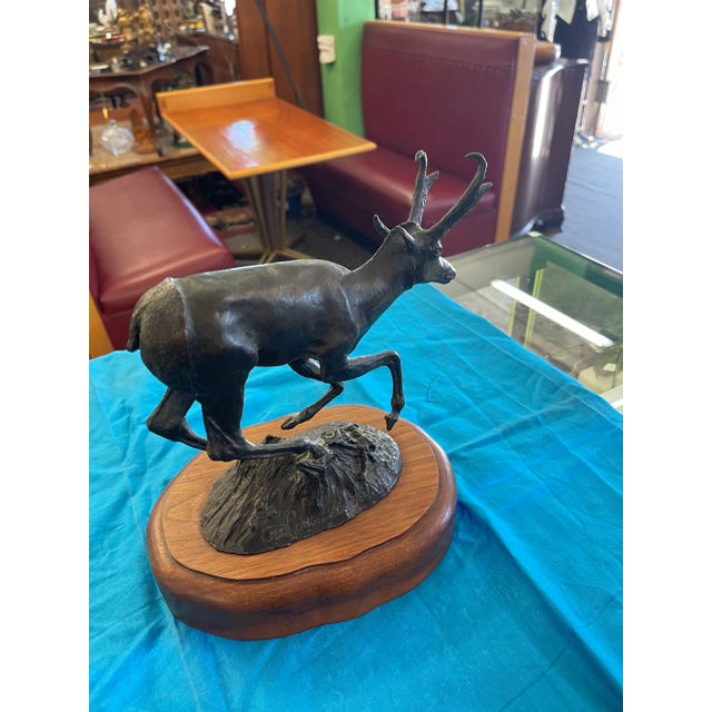 Add a touch of elegance to your collection with this beautiful Ted Long Bronze Antelope. Crafted with high-quality bronze...