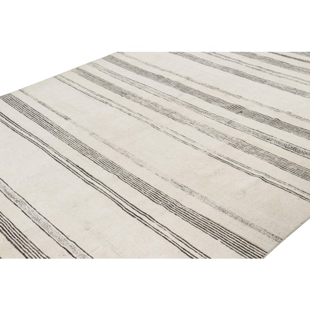 Made with hand-knotted wool, this 7x10 contemporary rug is an exciting addition to the Modern rug collection by Rug &...