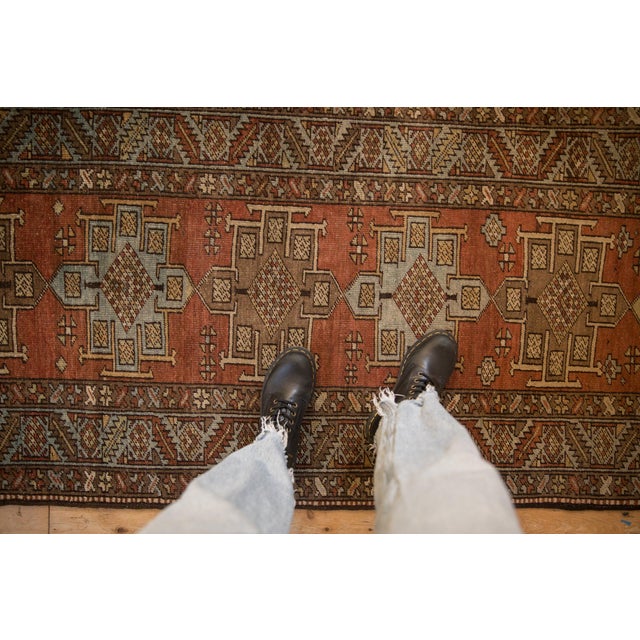 :: Single column repeating geometric center medallions with interior diamond shaped checkered flower design motif each...