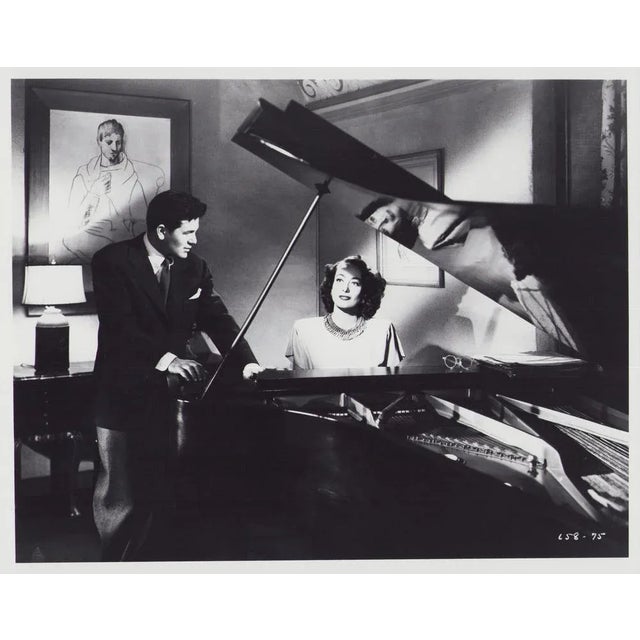 Original black-and-white lobby card for the film "Humoresque" (1946) featuring Joan Crawford and John Garfield. This...