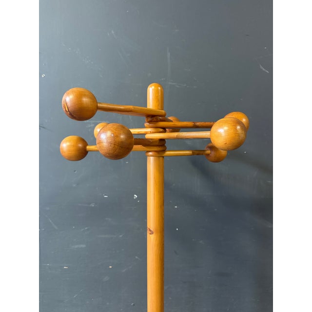 Dimensions: H 64” x W 23.5”. Vintage Scandinavian pine coat rack with adjustable hangers by Rainer Daumiller, 1970s.