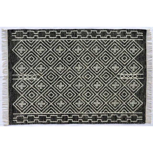 Nice new Kilim with geometrical tribal design and nice colors, entirely handwoven and embroidered with wool on cotton...
