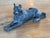 19th century Austrian bronze dog lying with forelegs stretched out and head raised, tongue lolling, ears pricked, wearing...