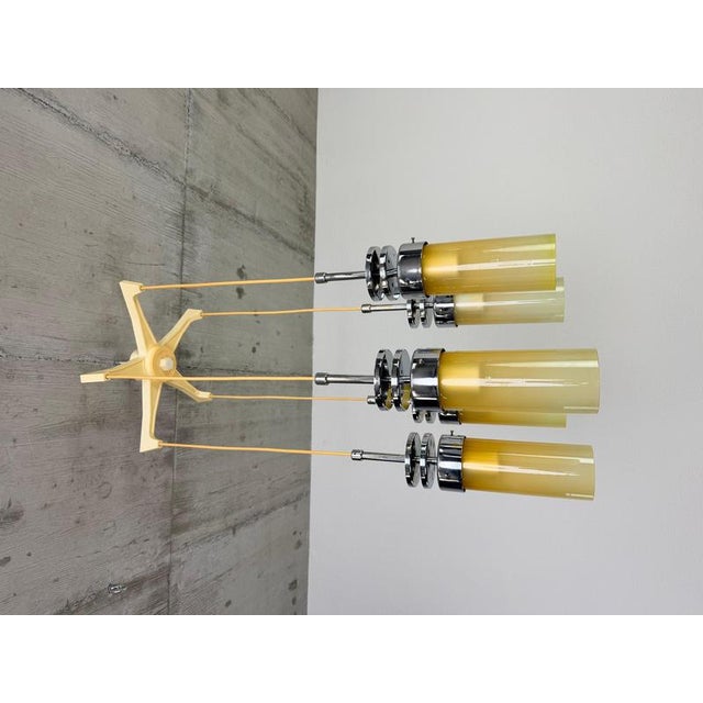 Bring a touch of authentic retro elegance to your interior with this exceptional mid-century modern cascade chandelier....