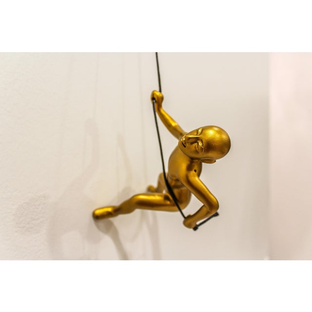 Modern Gold Position Climbing Man Durable Polyresin 3d Hanging Wall Art Sculpture with Leathered Rope and Hanging Hardware by Eladitems For Sale - Image 3 of 3