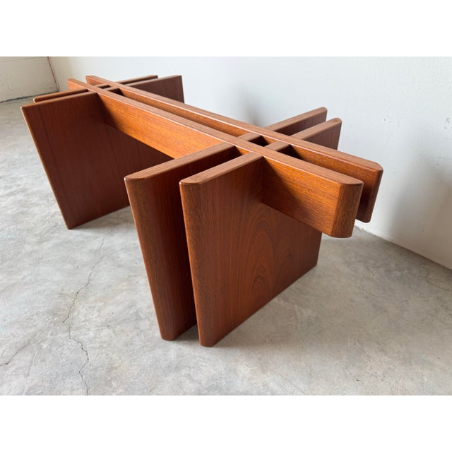 A striking 1970s Danish modern coffee table designed by Gustav Gaarde for Trekanten Hestbaek, Denmark. This sculptural...