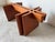 A striking 1970s Danish modern coffee table designed by Gustav Gaarde for Trekanten Hestbaek, Denmark. This sculptural...