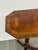 Design Plus Gallery presents a Tilt-Top Satin Wood Side Table from Baker Furniture. The interesting tilt-top side table...