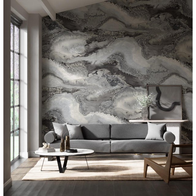 This stunning digitally printed wallpaper panel displays a highly figurative interpretation of an original ink and salt-...