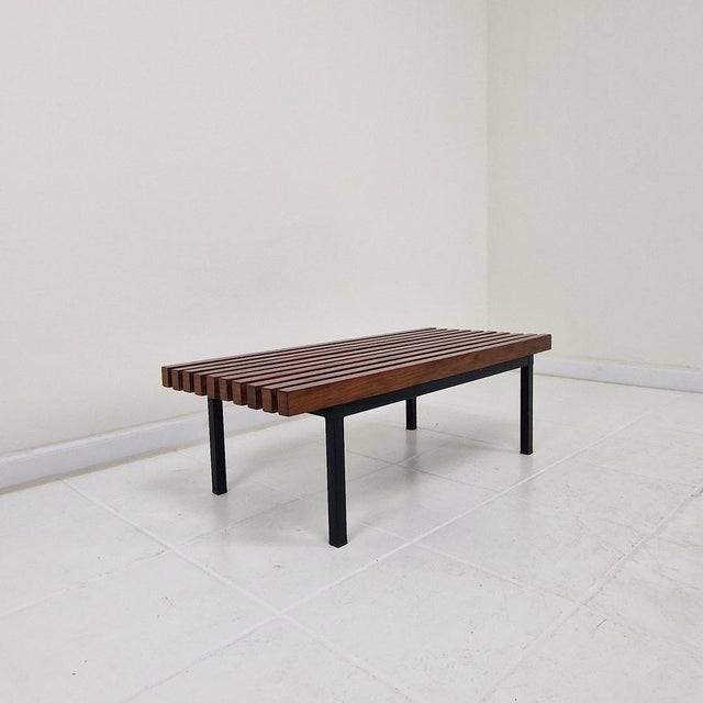 Elegant Italian bench from the late 20th century, defined by its clean lines and refined minimalist aesthetic. The seat is...