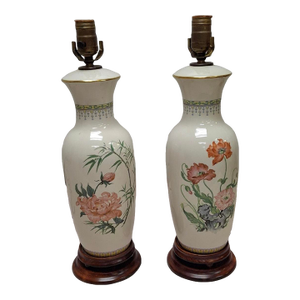 Mid 20th Century Pair of Chinese Off-White Floral Porcelain Table Lamps on Carved Mahogany Base