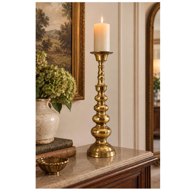 Tall Brass Pricket Floor Candlestick Tall brass pricket candlestick featuring an elegant sculptural silhouette with...