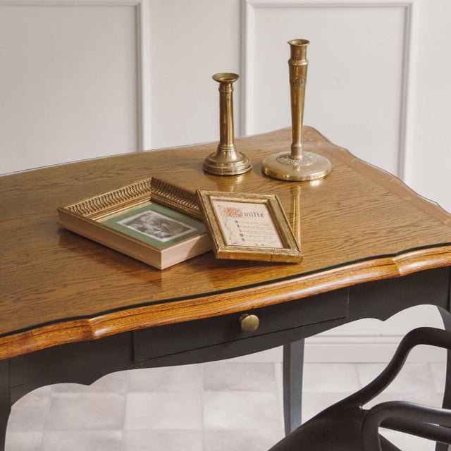 A louis xv-style desk, crafted in the second half of the 20th century as a period piece based on french designs. The...