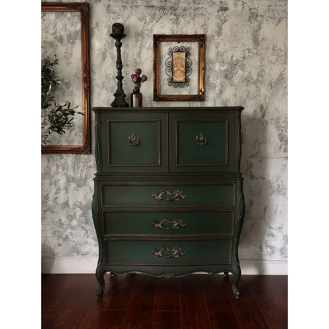 Some pieces hold their beauty quietly, waiting for the right hands to draw it out. This 1960s Century French Provincial...