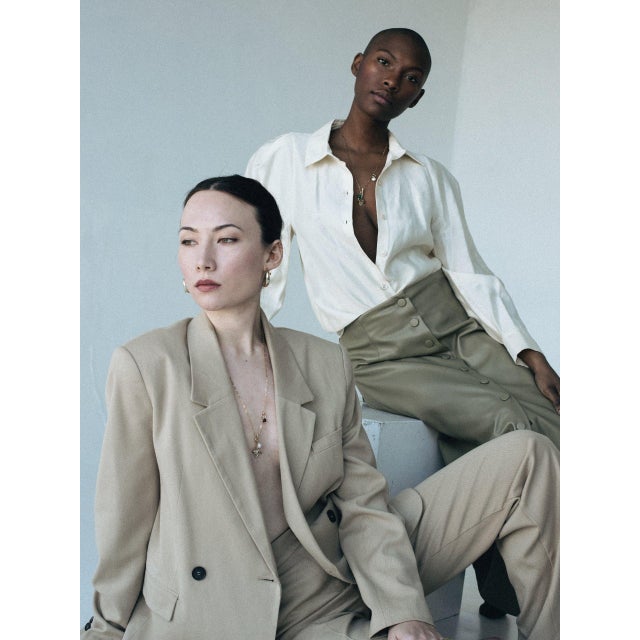 This long pendant is a staple for this season. Materials: Hand-carved from wax hangs an 18K Gold Plated Brass Tulip Flower...