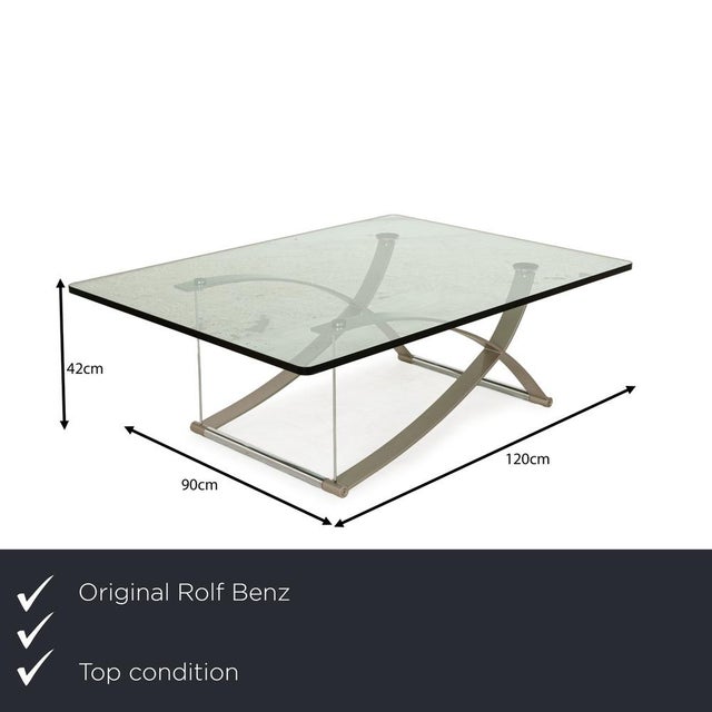 The 1150 glass table by Rolf Benz impresses with its timeless design. The rectangular glass top with minimally rounded...