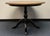 Charming Ethan Allen dining table from the New Country collection, featuring a warm honey-toned wood top with beautiful...