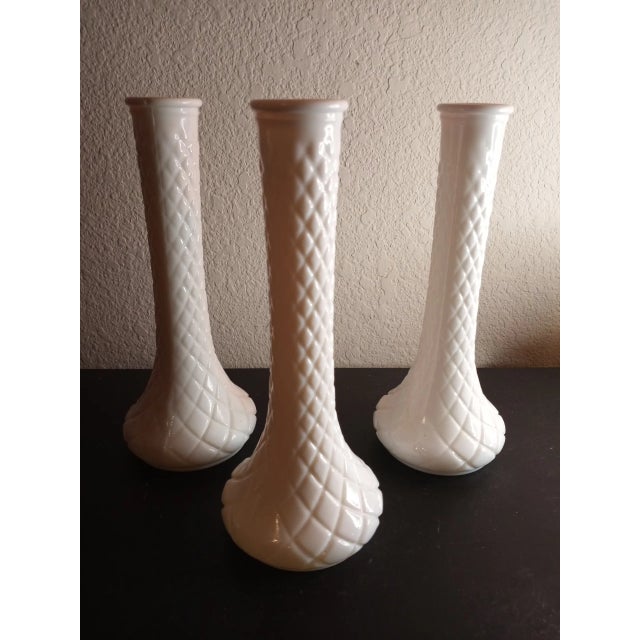 These are vintage Hoosier Milk Glass Quilted Diamond Pattern 9" Decorative Vase Set of 3. Procured at auction BOX 17