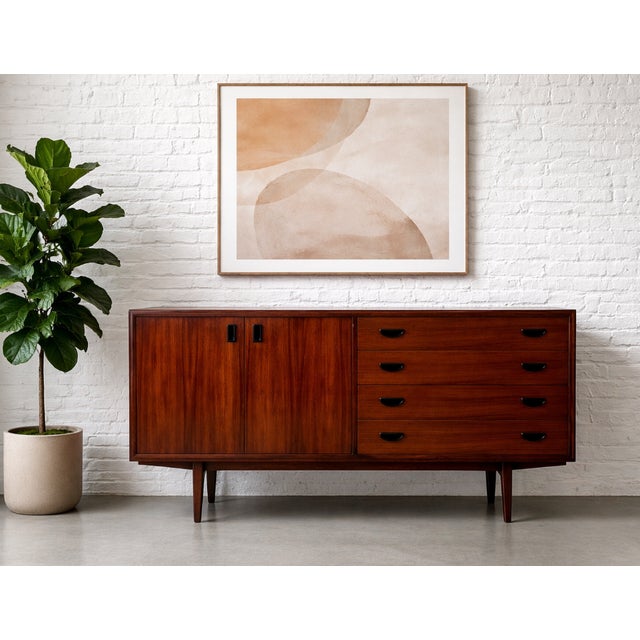 Mid Century Modern Rosewood Credenza, Made in Denmark, c. 1960’s. Beautifully proportioned and crafted in richly figured...