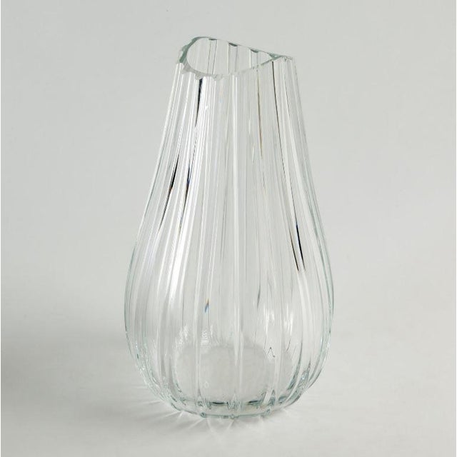 Pistil Vase by William D. Scott The Pistil Vase is made from hand blown Italian glass. Watertight, this vase is the...
