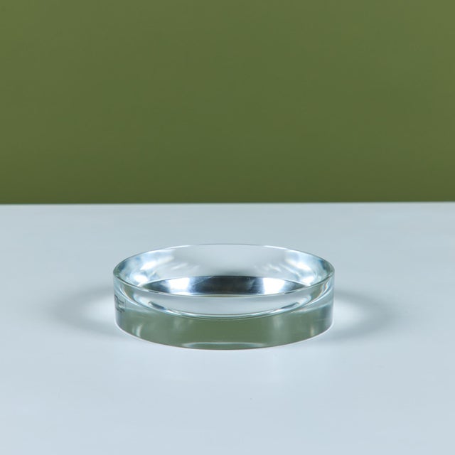 Round Murano glass dish made in Italy for V. Nason and C, features a thick round glass form with a deep well. Dimensions...