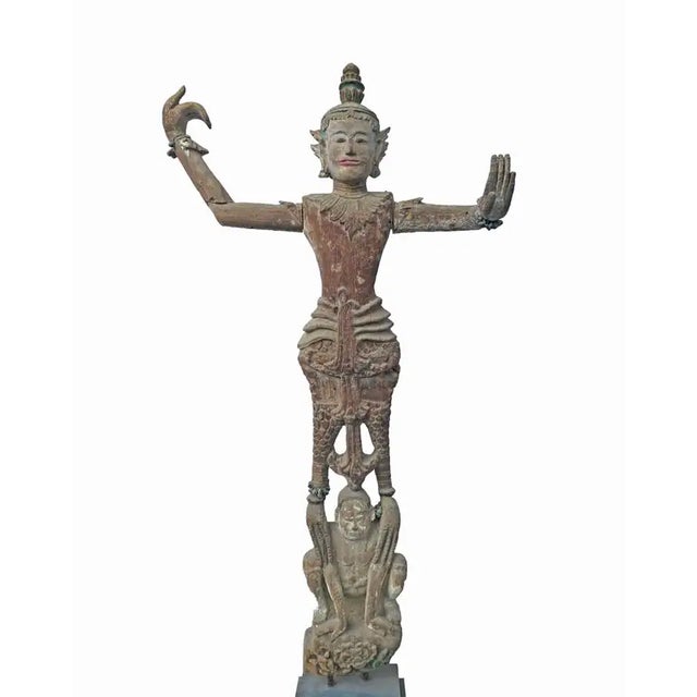 These statues are adorned wood-carved Burmese Mandalay 'Nat' Spirits from the early 20th century. Nats were worshipped by...