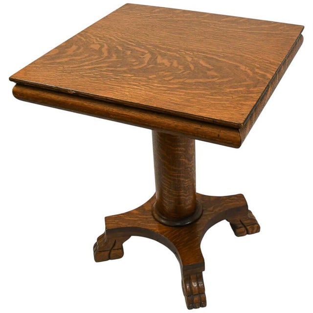 This remarkable Antique 19th-Century Lion's Feet Oak Wood Table is a testament to the craftsmanship and design of the...